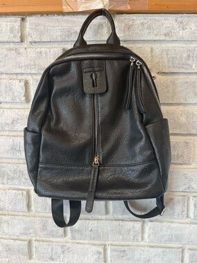 Moda Luxe Black Leather Backpack with Front Zip Detail